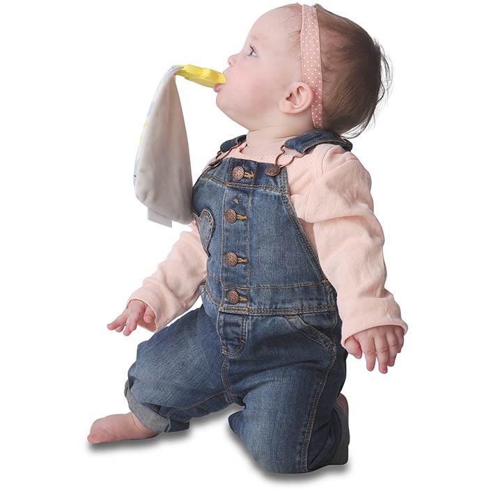 Munch-It Blanket - You Are My Sunshine - a convenient teether and cozy blanket for baby. Designed to target baby's emerging front& eye teeth as well as early molars. The soft blanket is perfect for snuggling and absorbing drool