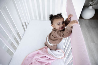 Why Is My Baby Chewing on Their Crib?! (And How We Accidentally Found a Solution)