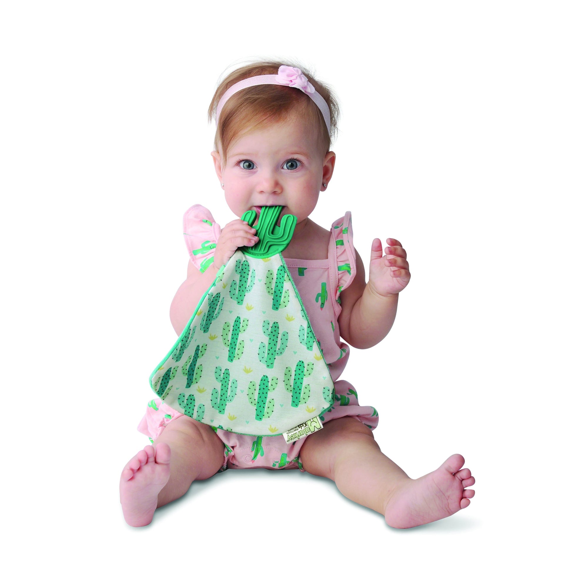 a convenient teether and cozy blanket for baby. Designed to target baby's emerging front& eye teeth as well as early molars.  The soft blanket is perfect for snuggling and absorbing drool