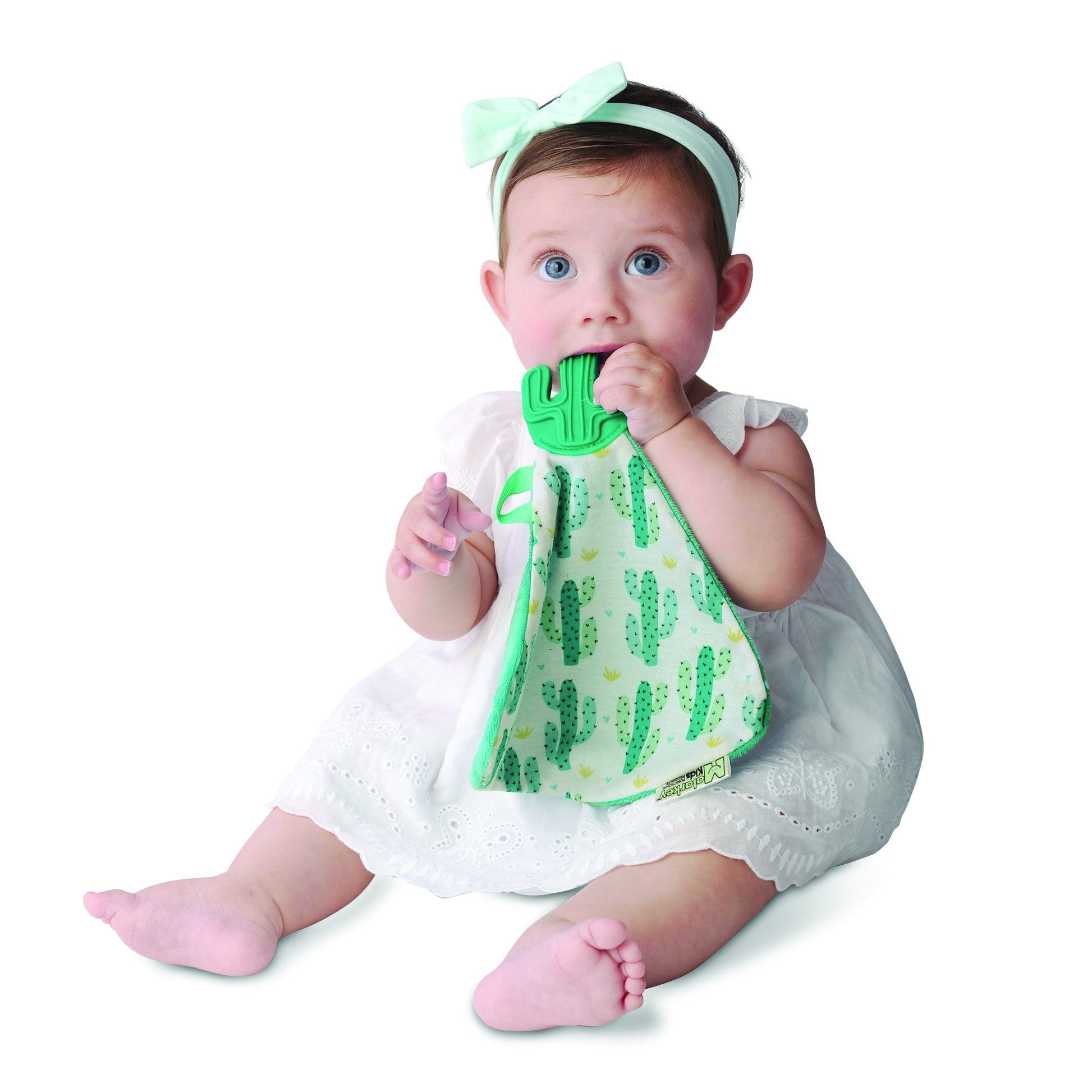 a convenient teether and cozy blanket for baby. Designed to target baby's emerging front& eye teeth as well as early molars.  The soft blanket is perfect for snuggling and absorbing drool
